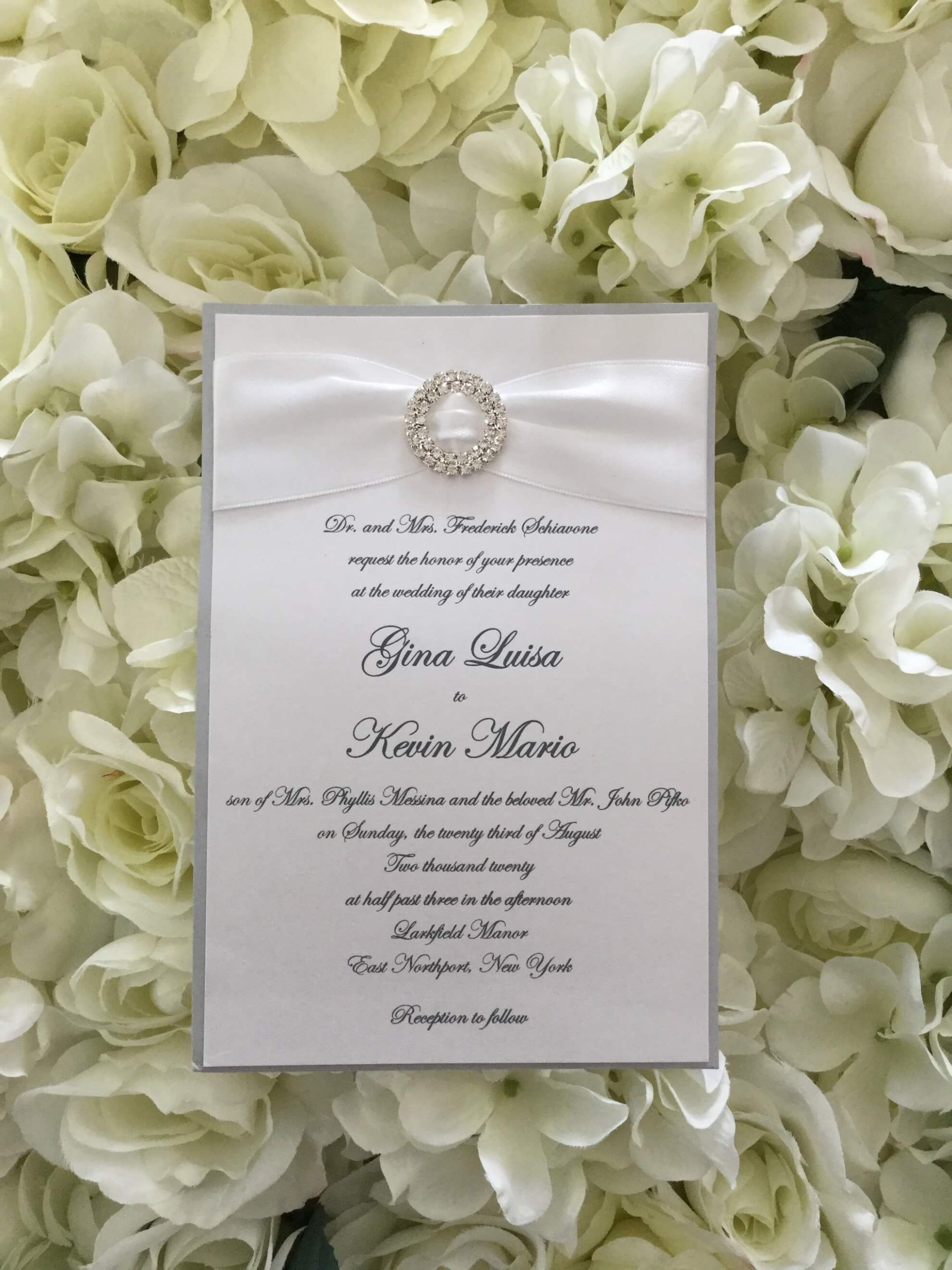 Larkfield Manor wedding invitation white shimmer with round brooch-2