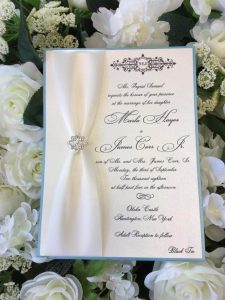 OHEKA CASTLE WEDDING INVITATION WITH BROOCH AND RIBBON